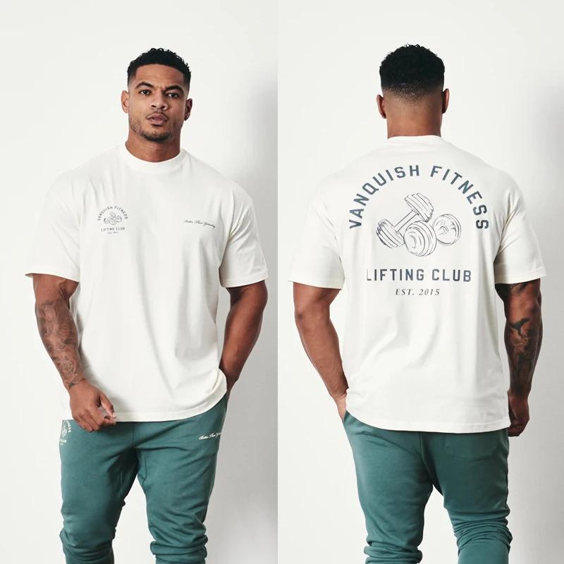 Graphic Tops | Logo Graphic T-Shirt  –  Mens Clothing Graphic Tops